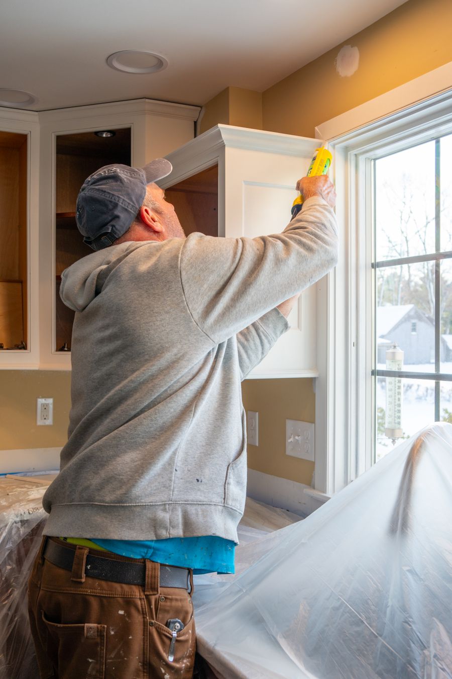 Kitchen cabinets being fitted