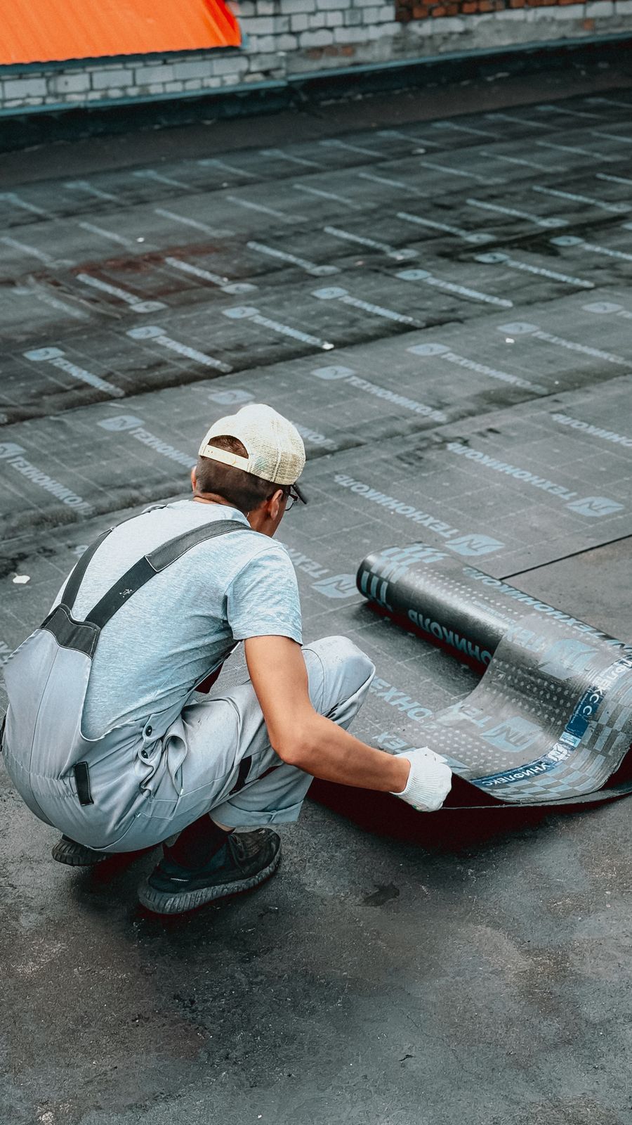 Waterproofing membrane being laid
